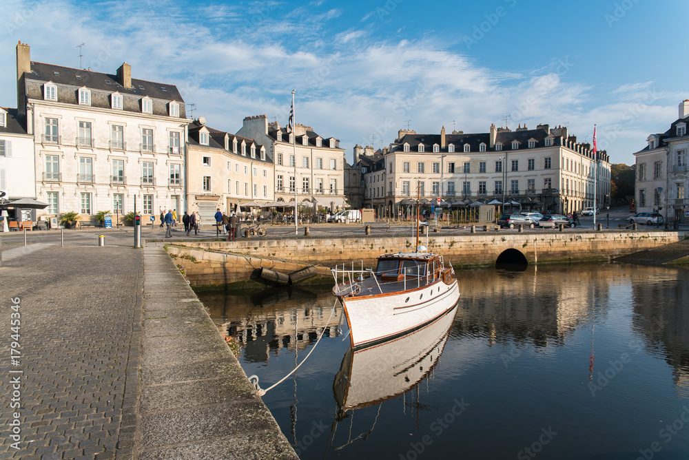 Houses and boats in the port of Vannes, magnificent city in Brittany
