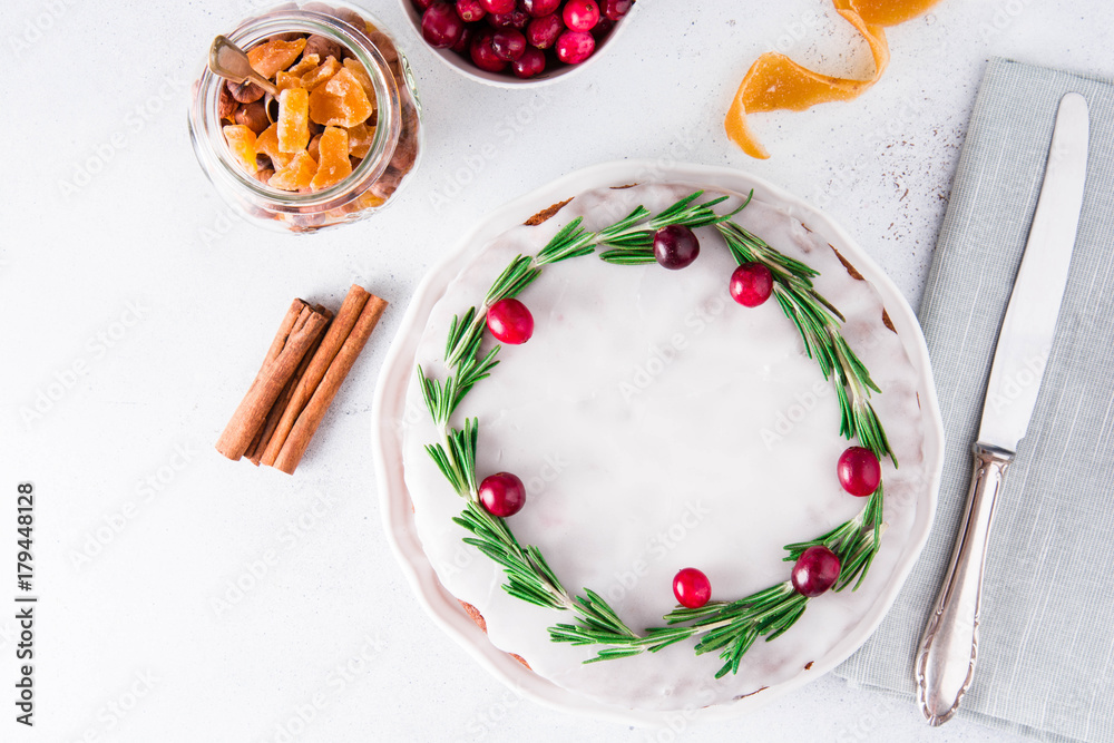 Christmas fruit cake, pudding on white plate. Copy space. Christmas fruit cake, pudding on white plate. Copy space.