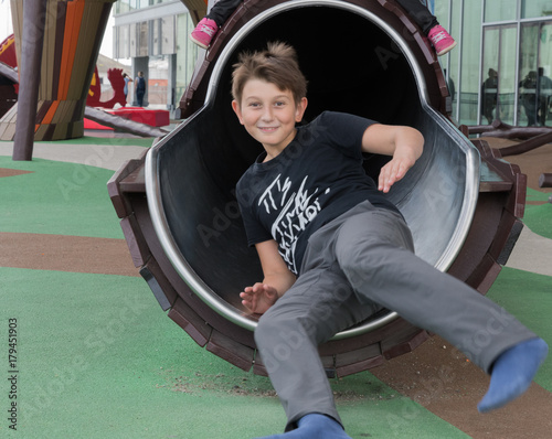 boy plays on children's games at the Dokk 1 building in Aarhus denmark