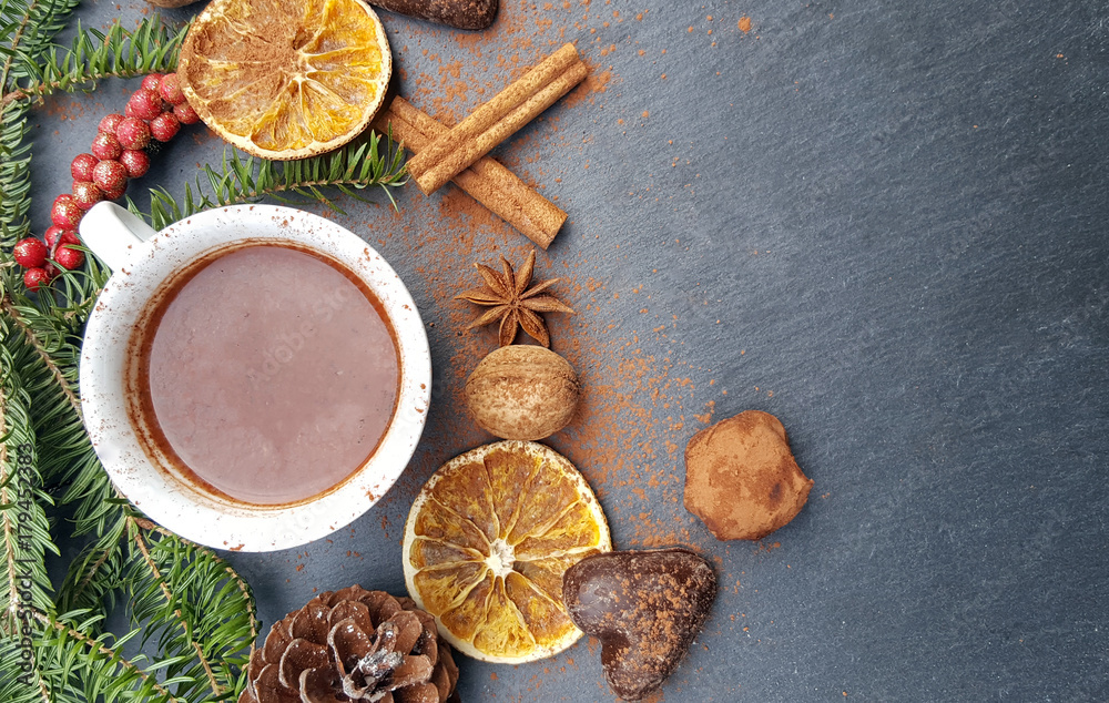 Christmas background with fir tree, nuts and hot chocolate Christmas background with fir tree, nuts and hot chocolate