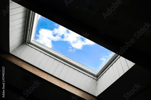 blue sky outside ceiling window
