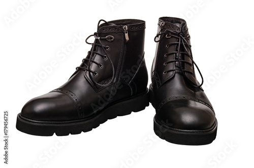 high black winter boots with lacing and lock on the thick sole, of leather and fur, comfortable and warm in the cold season