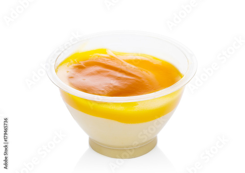 Mango dessert yogurt mousse in plastic container