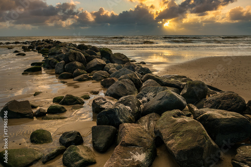 Rocks in the sand photo