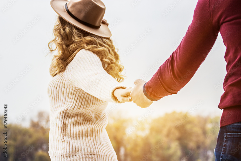 Couple Holding Hands Walking Away