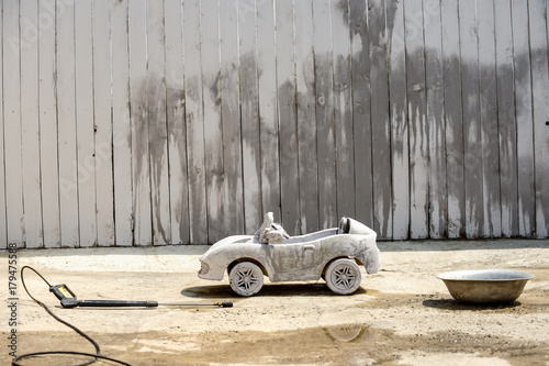 A toy car after washing high pressure. Copy space. photo