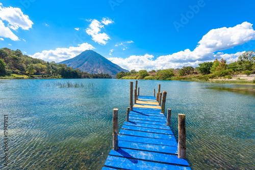 Beautiful bay of Lake Atitlan with view to Volcano San Pedro in highlands of Guatemala, Central America © Simon Dannhauer