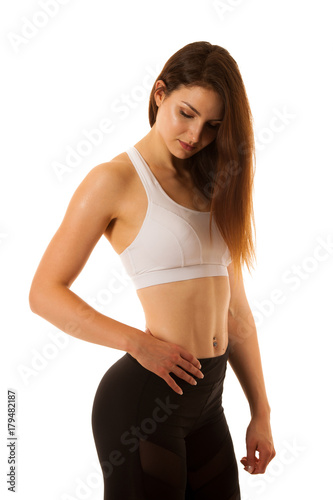 Active young sporty hispanic woman workout with dumbbells isolateda