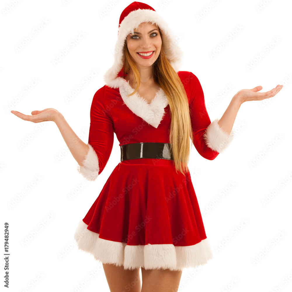 Beautiful young woman in santa claus dress isolated over white background Beautiful young woman in santa claus dress isolated over white background