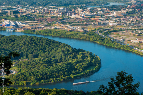 Aerial view of Chattanooga with barge on the river