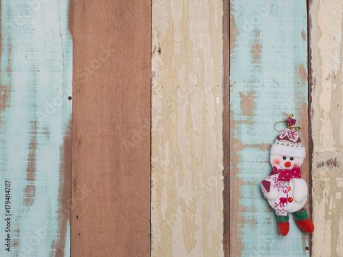 Christmas decoration cute object with wood background .