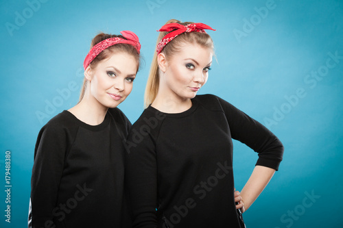 Portrait of retro pin up girls in red handkerchief.