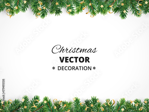 Winter holiday background. Border with Christmas tree branches and ornaments.