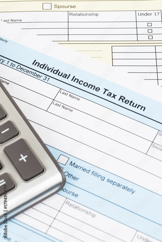 Tax form and calculator; document are mock-up Tax form and calculator; document are mock-up