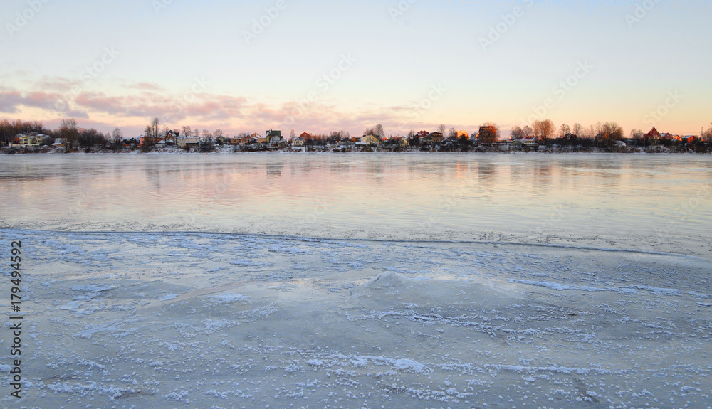 View of Neva River at winter sunset.