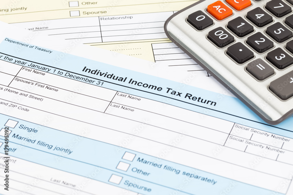 Tax form and calculator; document are mock-up Tax form and calculator; document are mock-up
