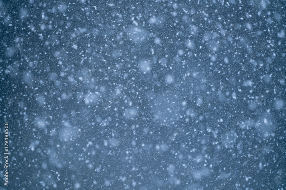 Texture of Snowflakes against bluish background