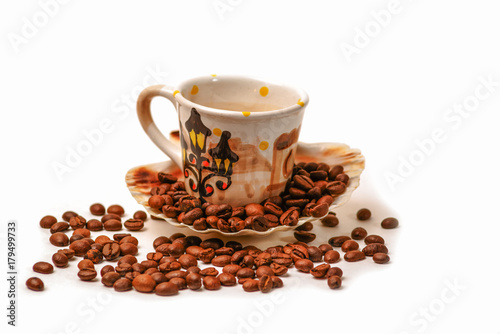 Grain coffee and a cup on a white background