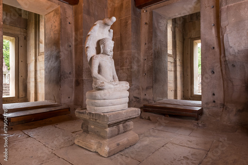 August 9, 2014: White stone carving buddha with naga in Pimai castle
