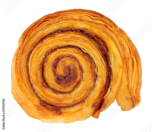 Cinnamon sweet pastry roll isolated on a white background