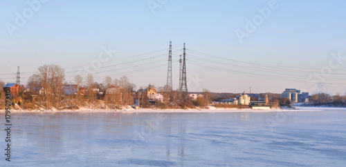 View of Neva River at winter sunset. © konstan