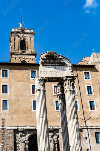 Remains of antique Temple of Vespasian and Tabularium, Forum Romanum, Rome, Italy. View of the columns of ancient temple and Tabularium in Foro Romano.