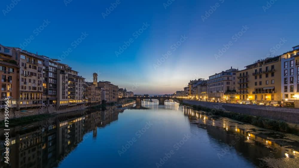 Twilight sky scene of Ponte Santa Trinita Holy Trinity Bridge day to night timelapse over River Arno Twilight sky scene of Ponte Santa Trinita Holy Trinity Bridge day to night timelapse over River Arno