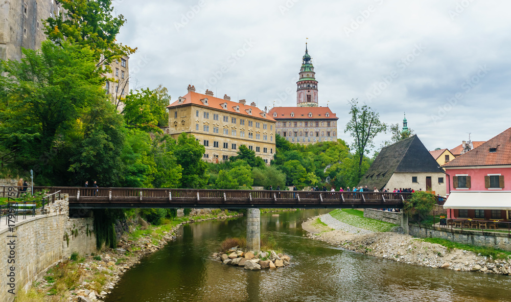 Krumlov Castle and pedestrian bridge across the Vltava in Cesky Krumlov in the Czech Republic in September