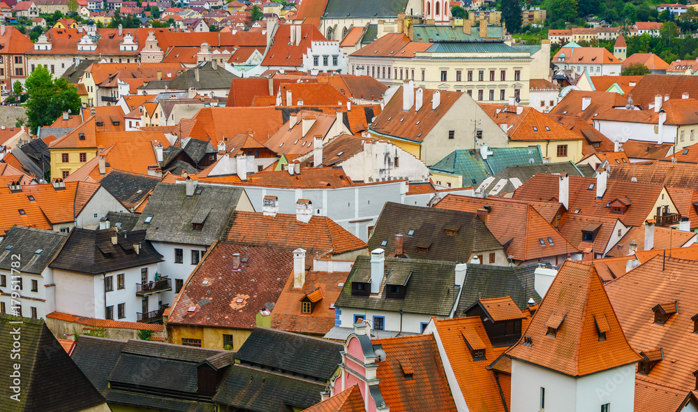Many red tiled roofs of old houses in Czech Krumlov in the Czech Republic