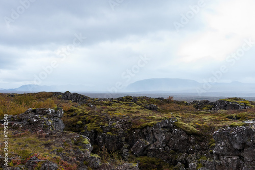 Murky mountains over the green mossy rocks © ukasz