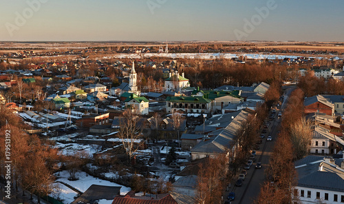 Panorama of the city of Suzdal from a bird s eye view Panorama of Suzdal from the air. Houses  temples  streets  trees are visible. In the yards lies snow. Suzdal. Golden Ring of Russia