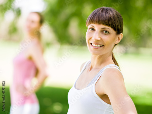 Young women exercising in the park