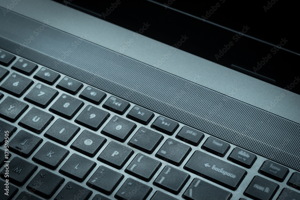 Silvery laptop keyboard for the whole photo Silvery laptop keyboard for the whole photo