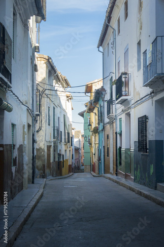 Fototapeta Naklejka Na Ścianę i Meble -  Narrow Street in the ancient city of Xativa, Spain