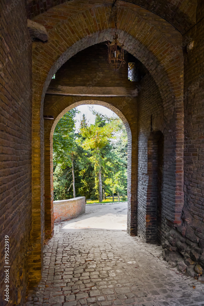 Brick arch, secondary entrance of Saludecio, a little medieval town in the Montefeltro, in the Emilia Romagna region, between Rimini and Urbino