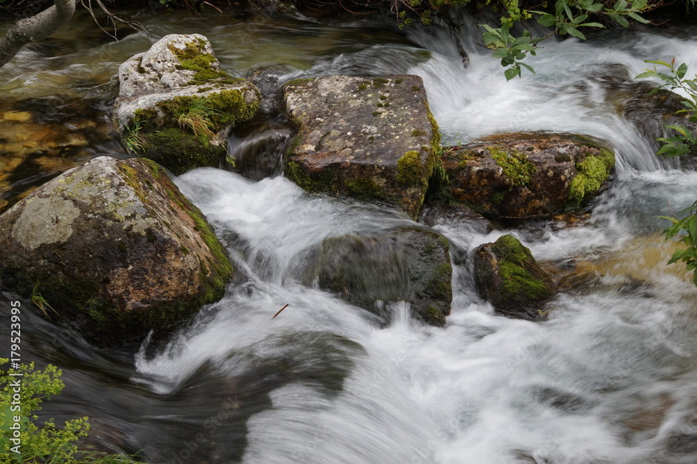 Nature in High Tatras in Slovakia. Mountains of rocky rocks cliffs and waterfalls suitable as background pictures of wishes, banners.