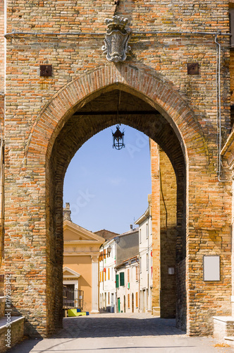 Brick arch, main entrance of Saludecio, a little medieval town in the Montefeltro, in the Emilia Romagna region, between Rimini and Urbino
