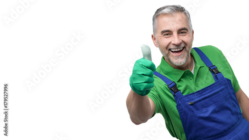 Happy professional gardener giving a thumbs up photo