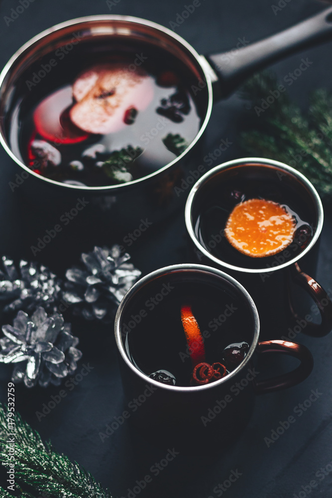 mulled wine in dark New Year decorations