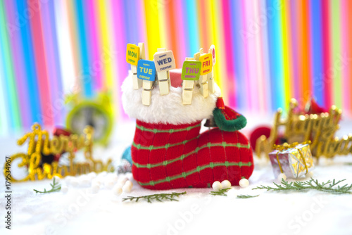 Christmas Background with Santa claus shoes and Paper clips