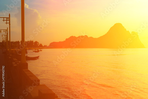 Bright colors at dawn on the beach at sunrise in the Gulf of Thailand.