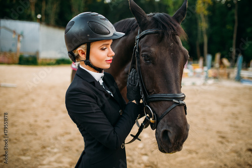 Equestrian sport, female jockey and horse face
