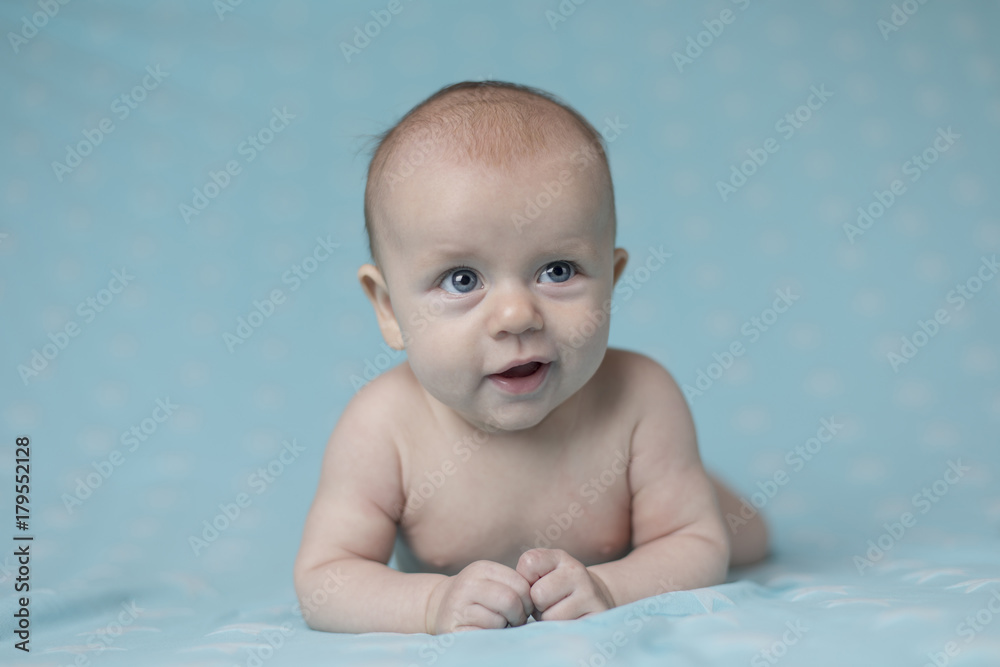 Cute happy baby girl crawling 
