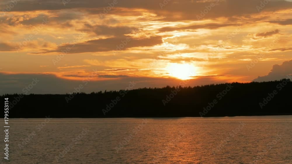 View from moving cruise ship - golden sunset on the river View from moving cruise ship - golden sunset on the river