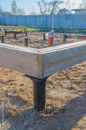 knocked together from boards, timber framing of a house under construction