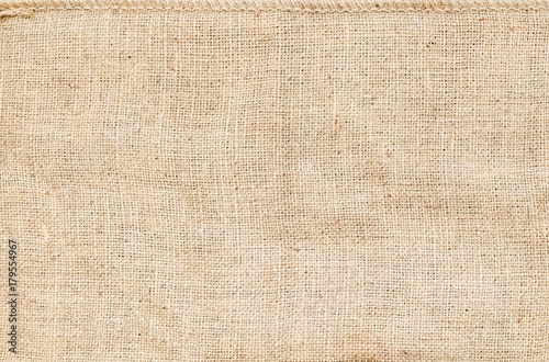 Background and texture of natural brown Sackcloth with Stitches Seam.