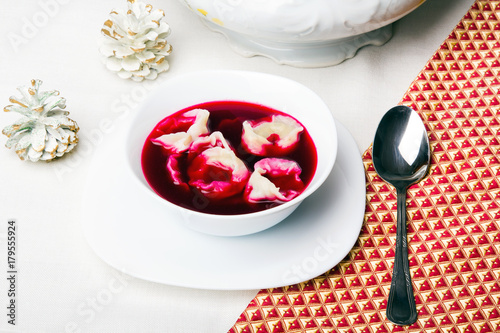 Red borsch with dumplings, traditional Polish Christmas Eve dish photo