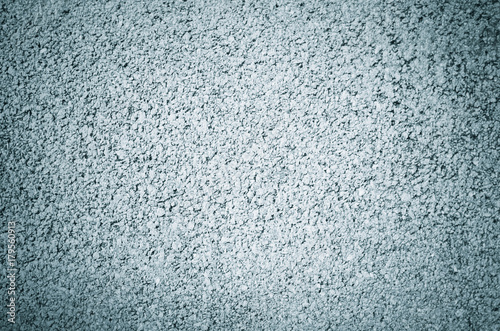 concrete wall texture with fine sand detail on the wall with vignette effect. abstract background.