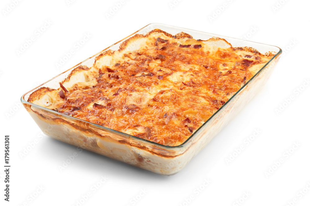 Delicious potato casserole in baking dish, isolated on white Delicious potato casserole in baking dish, isolated on white