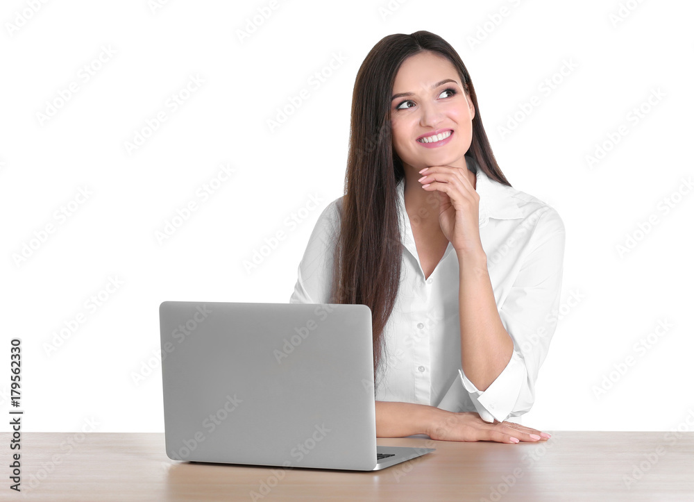 Beautiful young woman with modern laptop at table on white background Beautiful young woman with modern laptop at table on white background